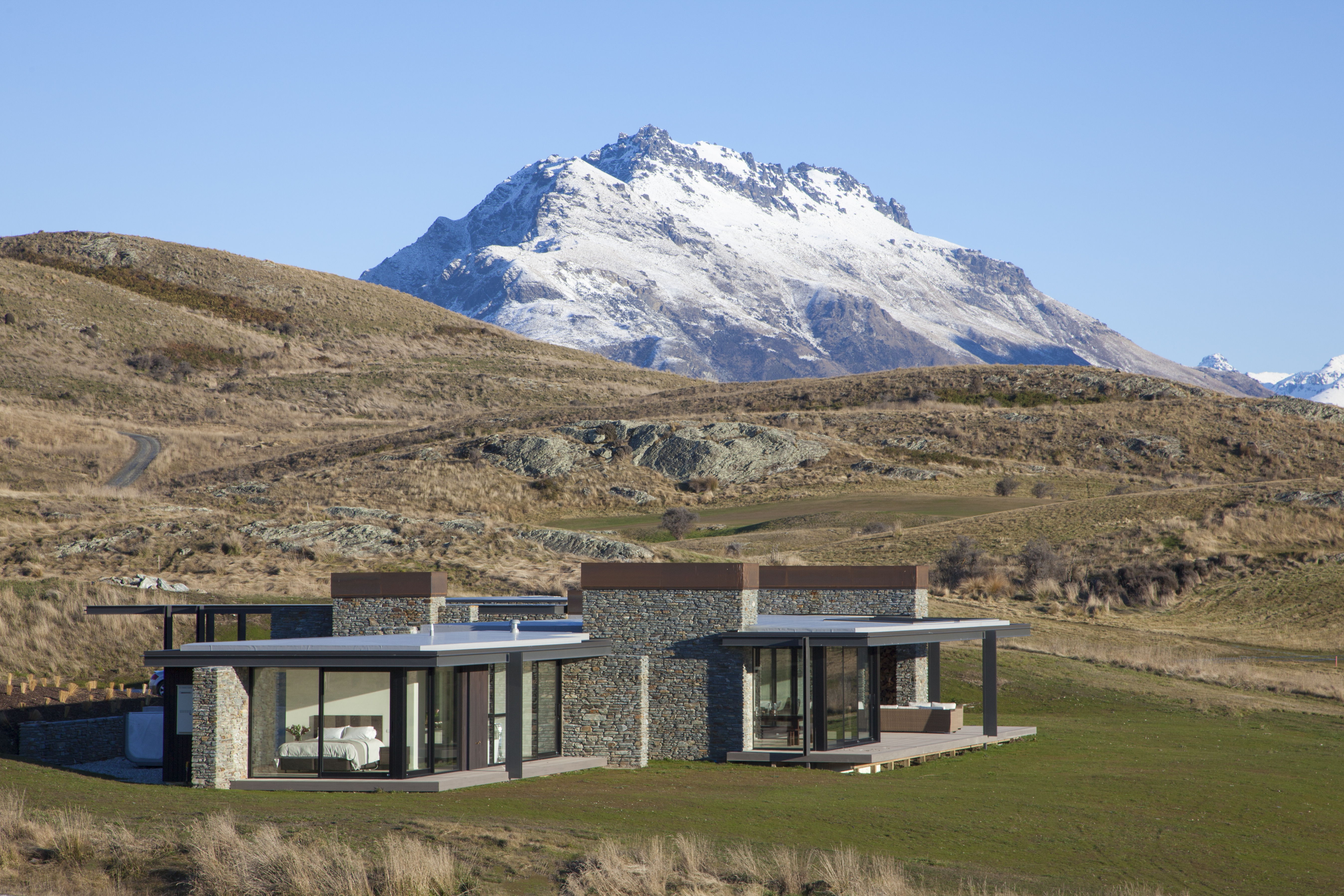 A home in an alpine environment featuring FMI Building Innovation Low-E glass windows 